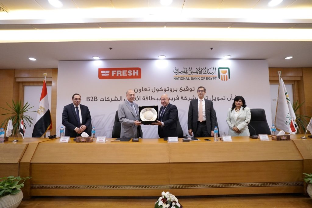 تعاون مشترك بين البنك الأهلي المصري وشركة فريش لتمويل التجار ببطاقة ائتمان الشركات B2B